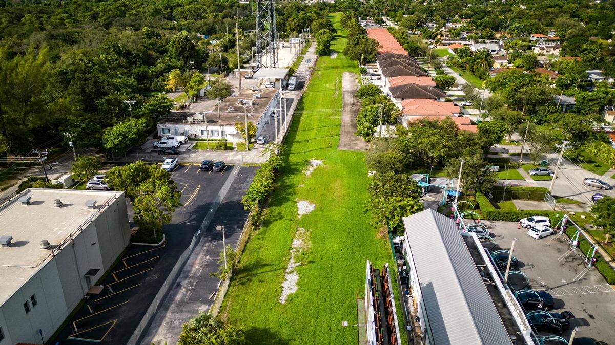 A drone view looking north shows a section of the defunct railway that will be converted into the Ludlam Trail near the intersection of Coral Way and Southwest 70th Avenue in west Miami-Dade County.