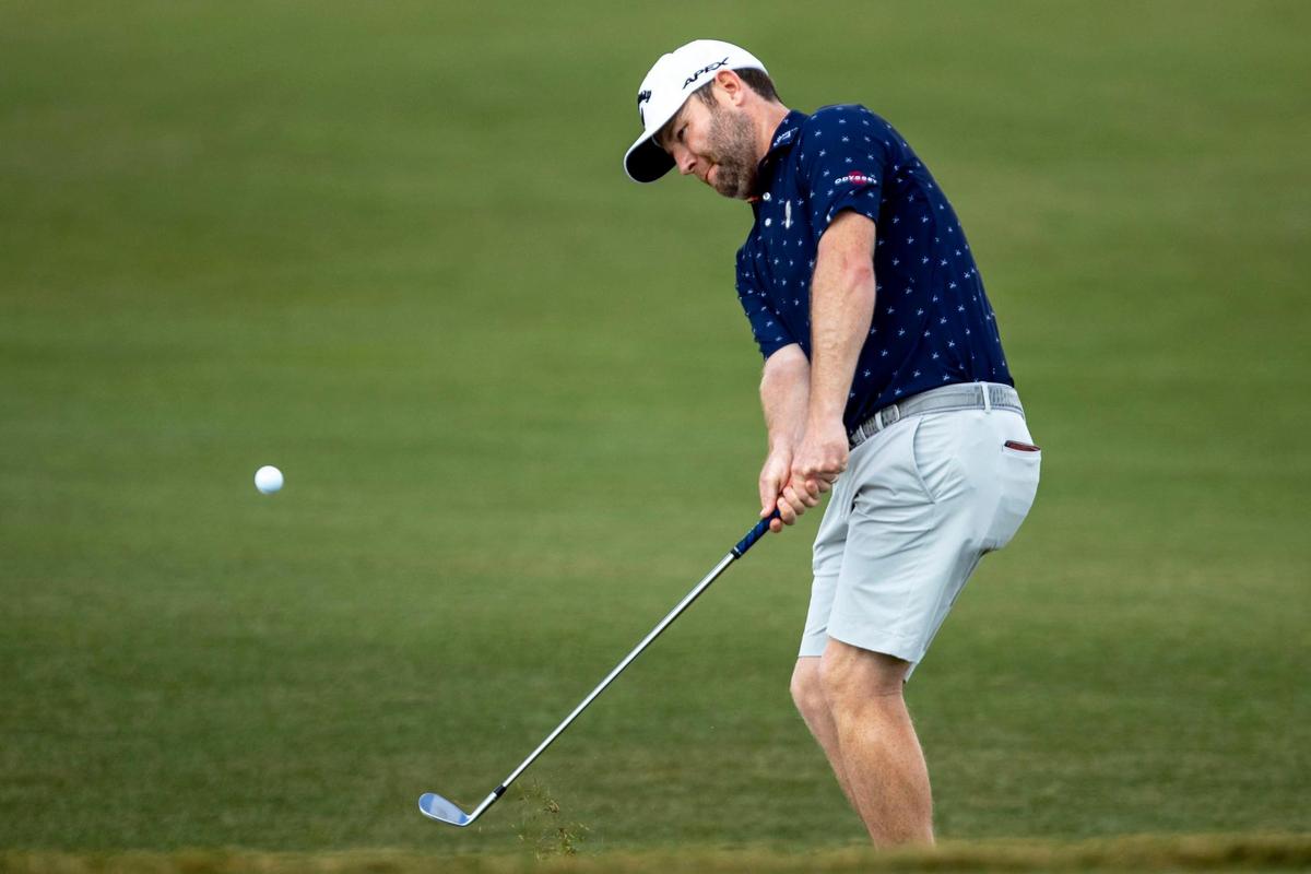Branden Grace chips from the 16th hole during the second round at the LIV Golf Invitational Miami at Trump National Doral Golf Club on Saturday, October 28, 2022 in Doral, Fla.