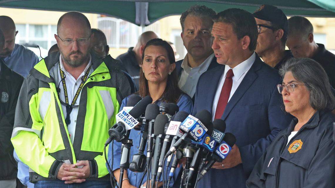 Gov. Ron DeSantis speaks to the media Thursday afternoon, June 24, 2021, following the partial collapse of the Champlain Towers South Condo at 8777 Collins Ave. in Surfside. With the governor in the front row are, from left, Kevin Guthrie, Florida Division of Emergency Management, Lt. Gov. Jeanette Nuñez, and Miami-Dade County Mayor Daniella Levine Cava.