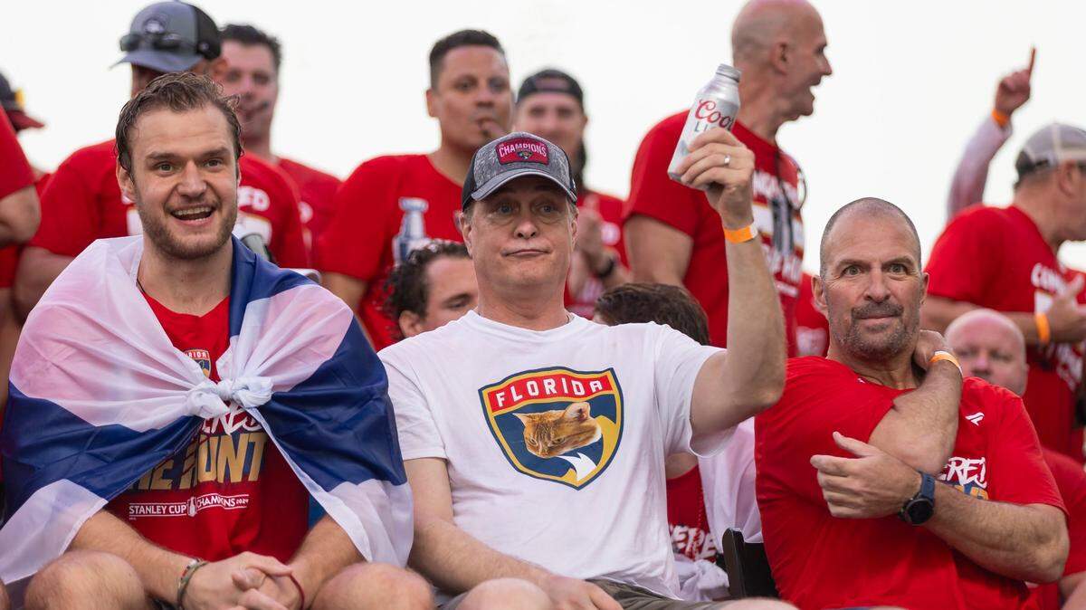 Florida Panthers center Aleksander Barkov (16), head coach Paul Maurice and general manager Bill Zito are seen on stage during a Stanley Cup victory parade rally at the Fort Lauderdale Beach Park off A1A on Sunday, June 30, 2024, in Fort Lauderdale, Fla. The parade was held to celebrate the Florida Panthers after they defeated the Edmonton Oilers in Game 7 of the Stanley Cup Final.