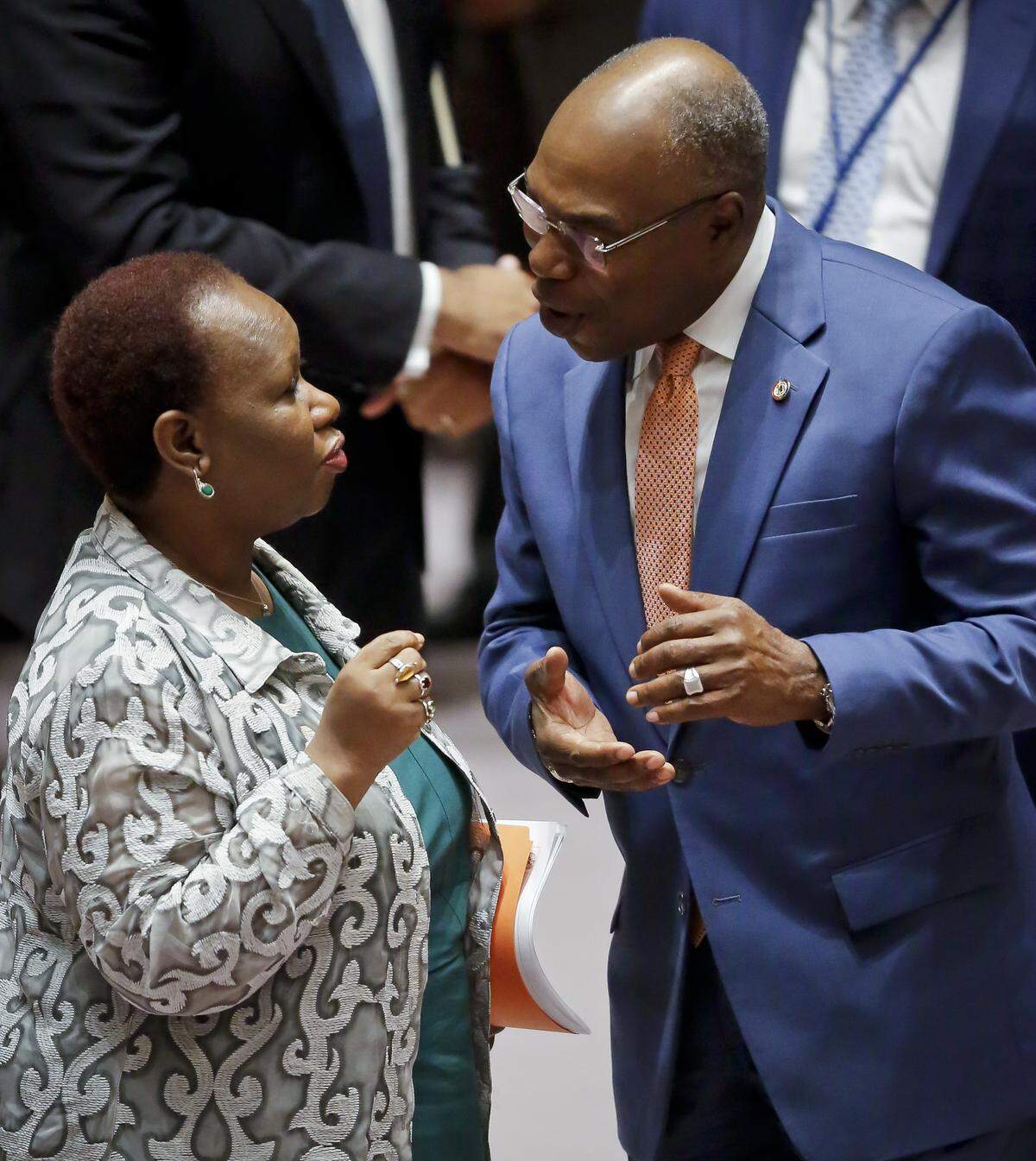 Haiti Ambassador to the United Nations, Denis Regis, right, confers with U.N. Assistant Secretary-General for Peacekeeping Operations, Bintou Keita, left, after both addressed a United Nations Security Council on Haiti on Thursday, Sept. 6, 2018, at U.N. headquarters.