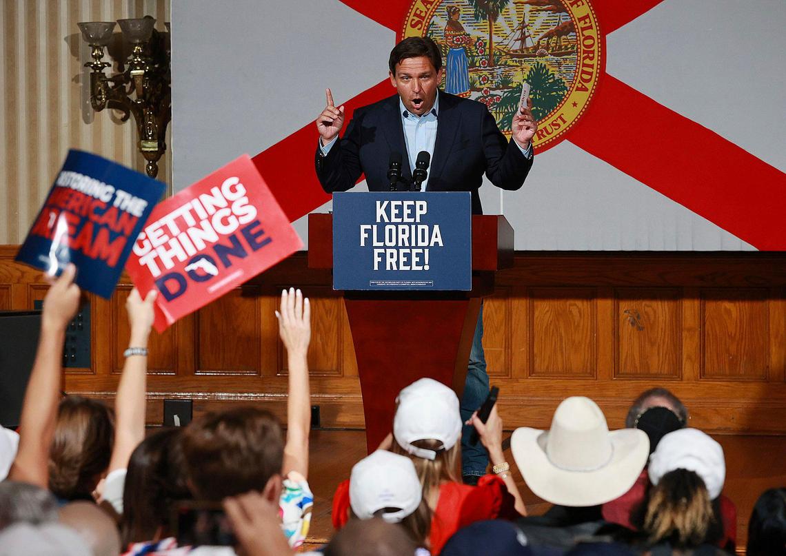 Florida Gov. Ron DeSantis speaks at a rally at the Cheyenne Saloon on Church Street in Orlando, Florida, on Monday, Nov. 7, 2022.