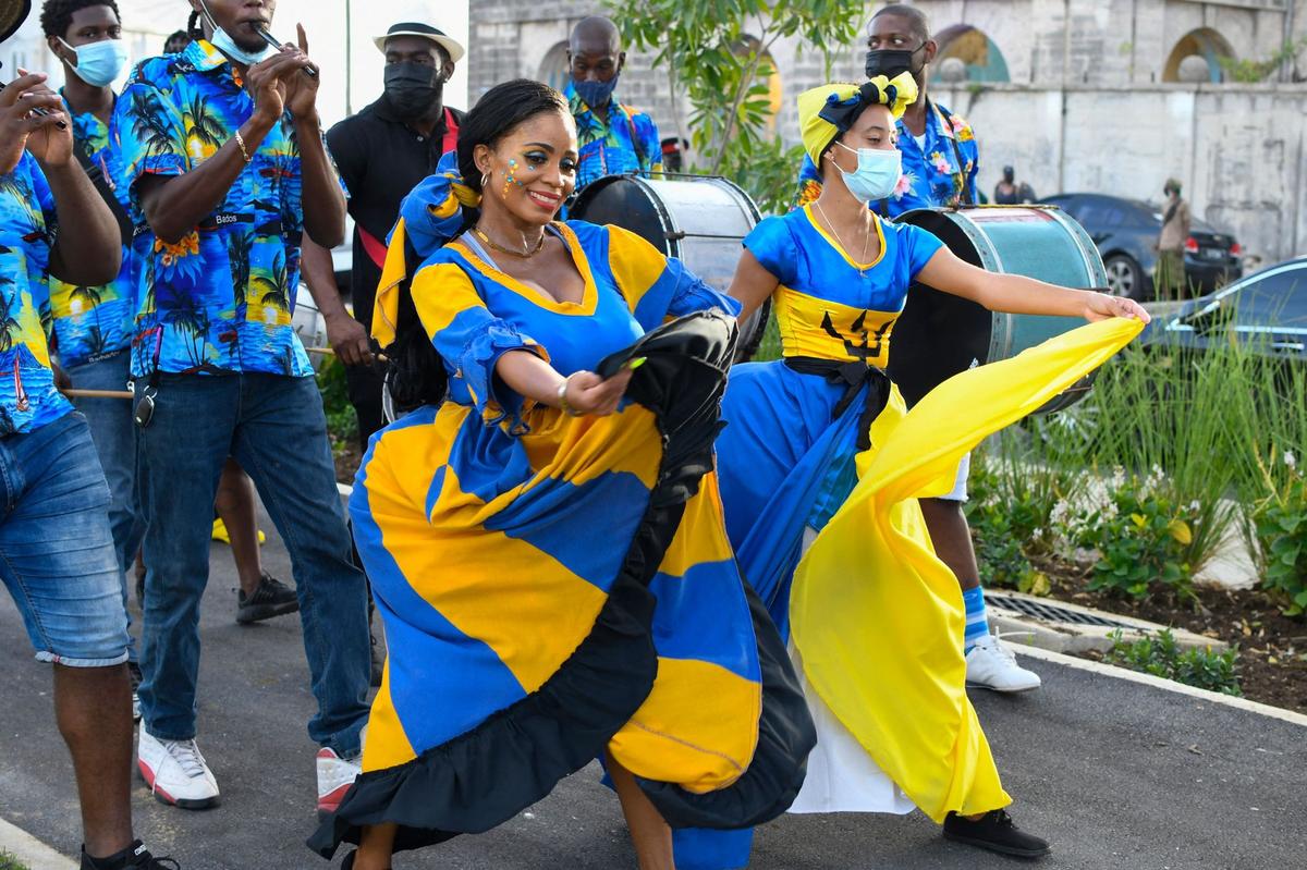 Women dance during a cultural presentation during the official opening of the Golden Square Freedom Park in Bridgetown, Barbados, on Nov. 27, 2021. Clement Osbourne Payne, an advocate for labor reform and one of ten National Heroes of Barbados, delivered a speech at Golden Square in 1937, urging black Barbadians to stand up to the white plantation owners. Barbados is about to cut ties with the British monarchy, but the legacy of a sometimes brutal colonial past and the pandemic’s impact on tourism pose major challenges for the Caribbean island as it becomes the world’s newest republic.