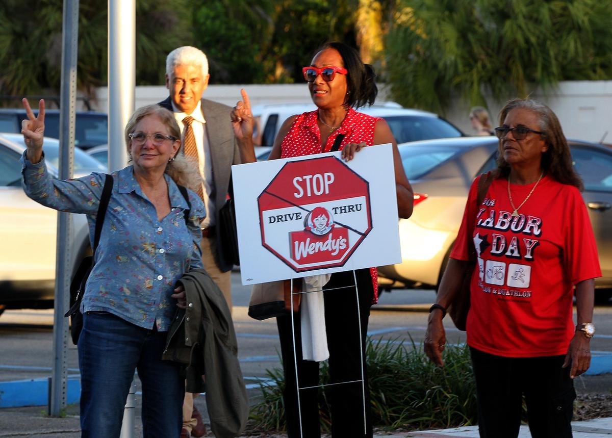A group of North Miami residents protested around the City of North Miami city hall against the opening of a Wendy’s restaurant drive-thru at 13400 N.E. Third Court ahead of a commission meeting to discuss the issue on Tuesday, September 24, 2019.