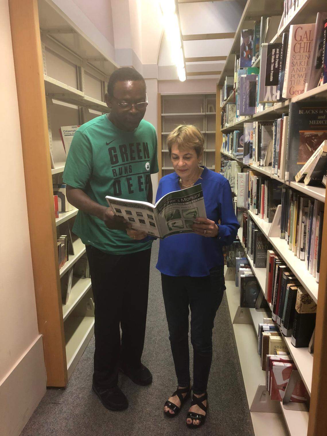 Ronnie Bryant with his reading tutor, Rita Lagace. They have been working together through Project Literacy for Every Adult in Dade.