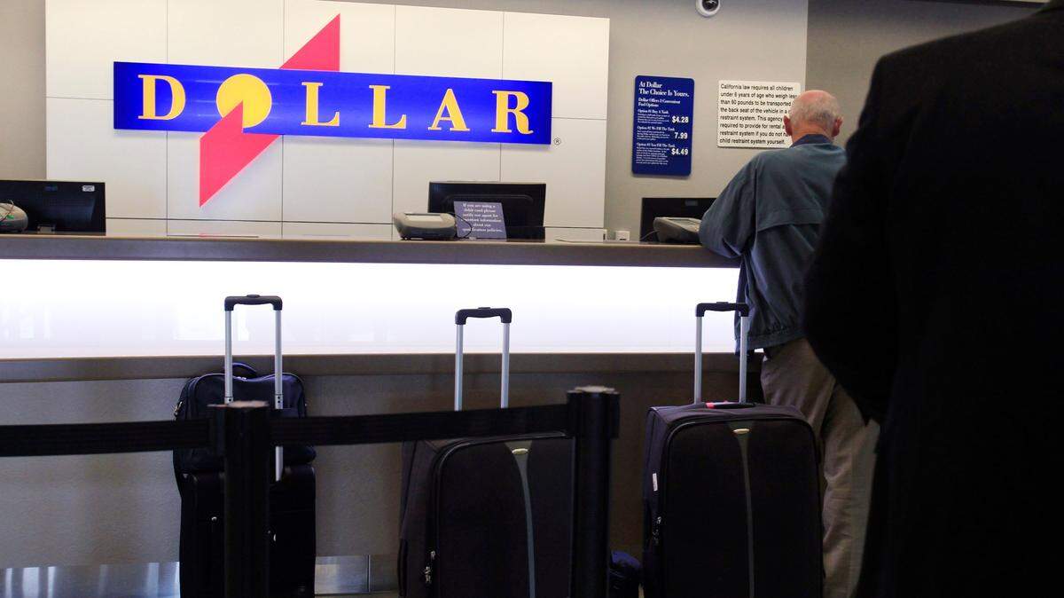 The parent company of Dollar and Thrifty rental car companies has settled a dispute over toll fees with the state of Florida.