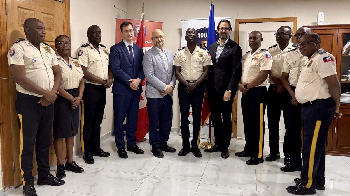 Canada’s U.N. envoy, David Lametti, (center, gray suit) meets with members of the Haiti National Police during an April visit to Port-au-Prince. Lametti is joined by U.N. Under-Secretary General for Safety and Security Gilles Michaud, to his immediate right, and on his left, Haiti National Police Director André Jonas Vladimir Paraison and Canada’s ambassador to Haiti, André François Giroux.