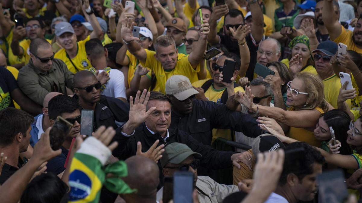 Brazil’s President Jair Bolsonaro greets supporters in Copacabana Beach during the country’s bicentennial independence celebrations in Rio de Janeiro in September.