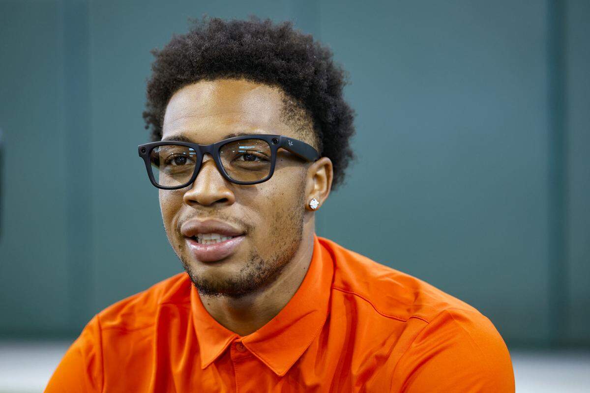 Miami Hurricanes wide receiver C.J. Daniels speaks to reporters during Media Day at the Carol Soffer Indoor Practice Facility in Coral Gables, Florida, on Wednesday, July 30, 2025.