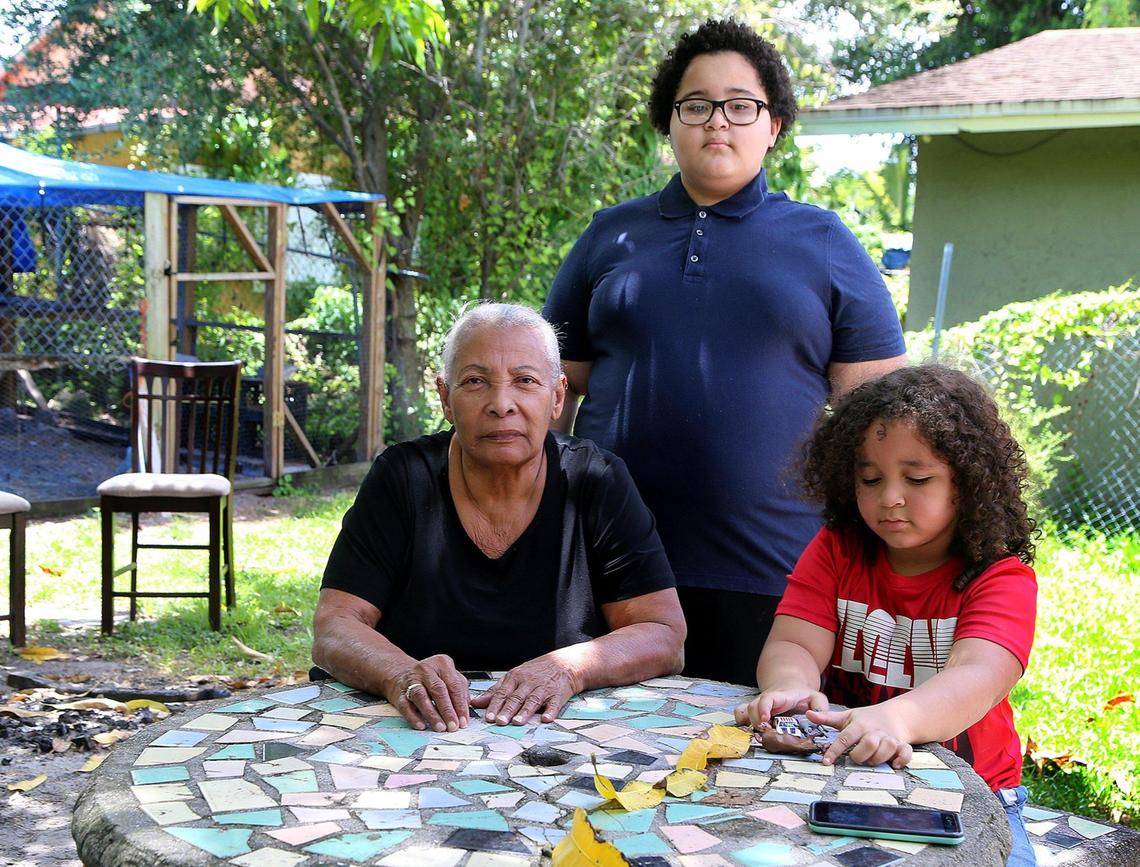 Asuncion Felipe posed at home with her grandsons Saiid Marte, center, and Ishaan Marte. Her daughter and the boys’ mother, Rosa Felipe, a Jackson Hospital healthcare worker, was one of the first to contract COVID-19 and remains in the hospital.
