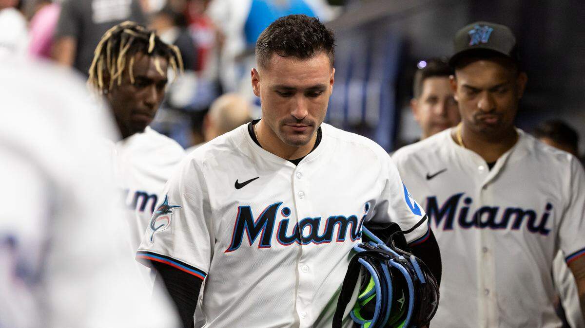 Miami Marlins catcher Nick Fortes (4) walks back to the locker rooms after losing to the Los Angeles Angels 7 to 4 during their MLB game at loanDepot park on Monday, April 1, 2024, in Miami, Fla.