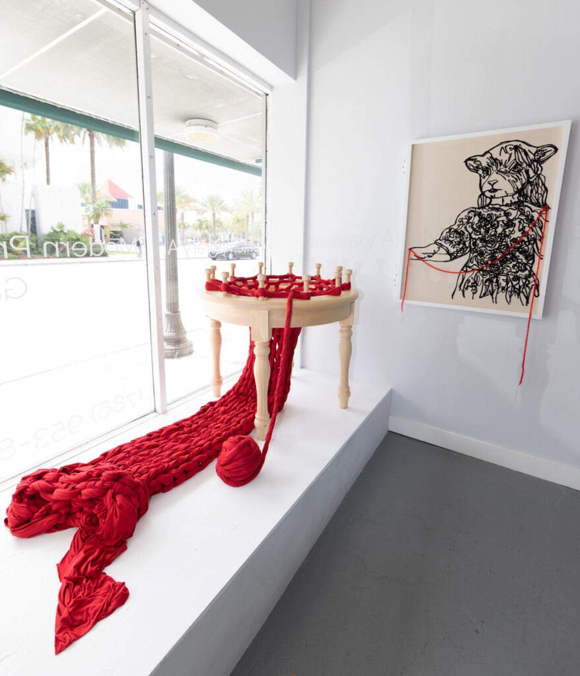 Rather than functioning as a static display, “Under the Red Tent” operates as an evolving space that invites visitors to move through it not just as viewers but as participants.