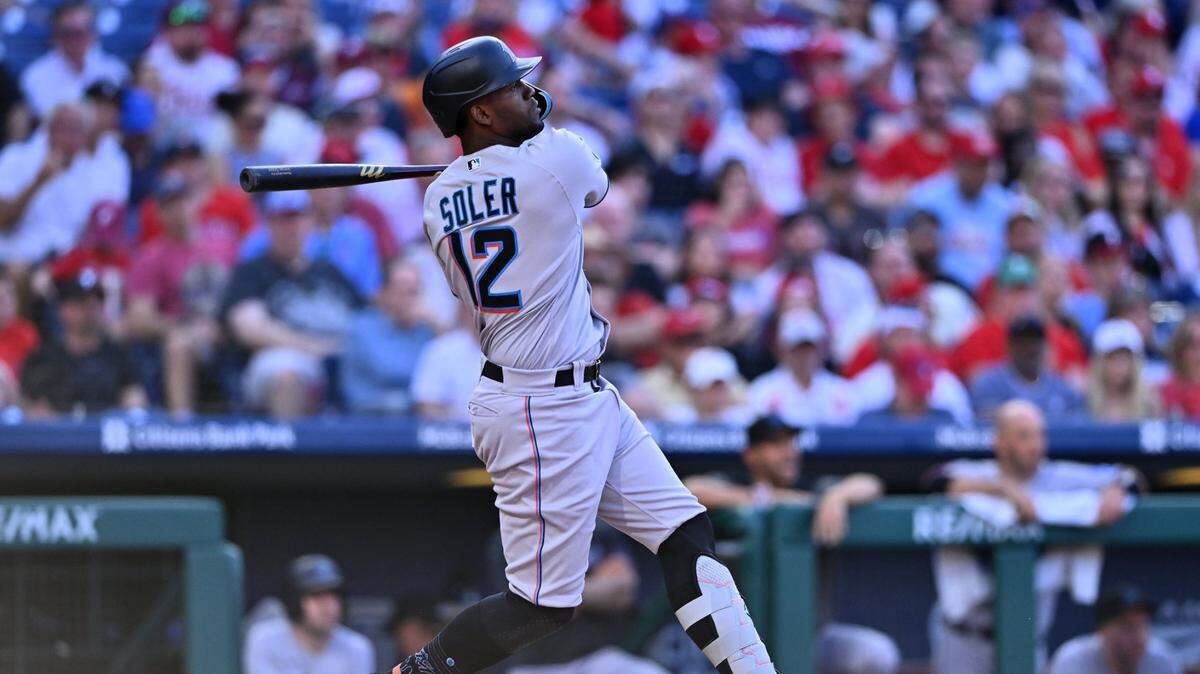 Miami Marlins outfielder Jorge Soler (12) hits a home run against the Philadelphia Phillies in the eighth inning at Citizens Bank Park on Wednesday, April 12, 2023.