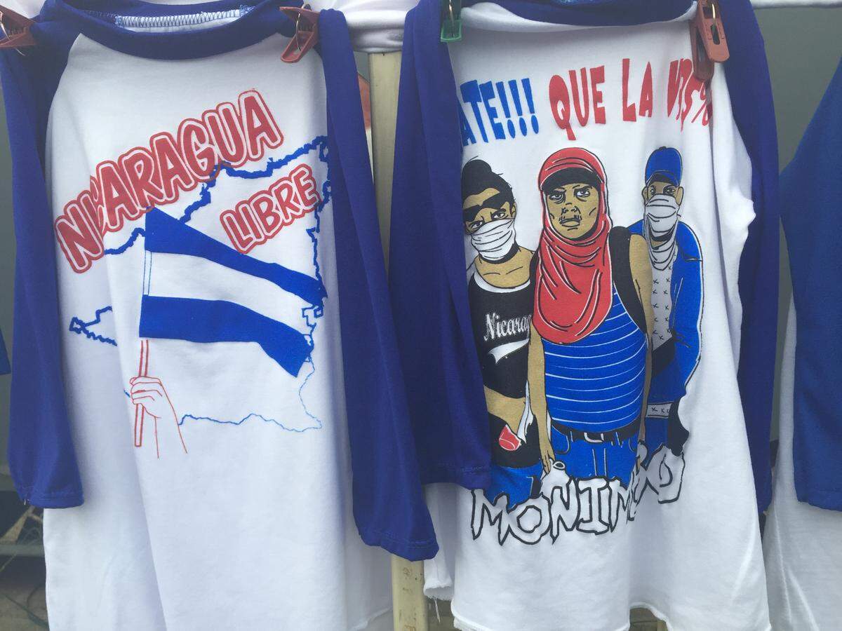 On the streets of Managua, Nicaragua, vendors sell protest shirts calling for a "Free Nicaragua" on June 7, 2018.