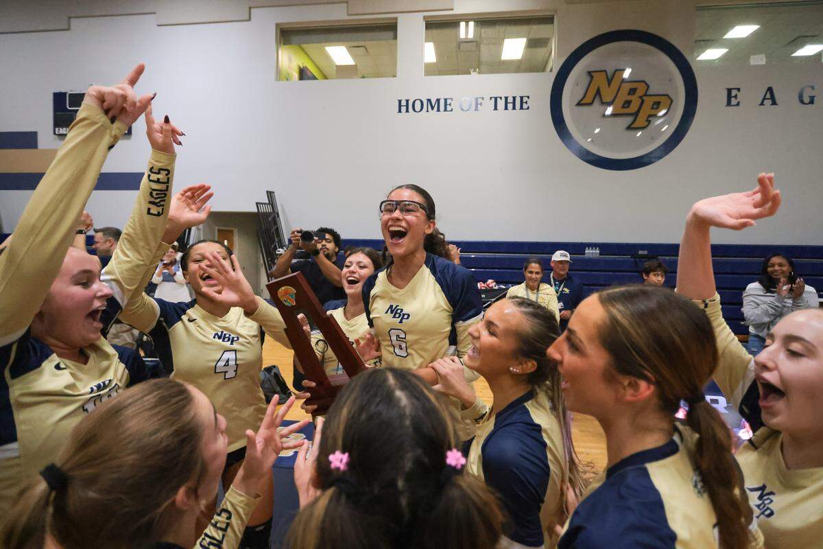 North Broward Prep opposite hitter Yasmin Dias Tonon (6) celebrates a victory with her teammates against Mater Lakes Academy during a Region 4-4A girls' volleyball regional final at North Broward Preparatory School in Coconut Creek, Florida, Wednesday, October 29, 2025.