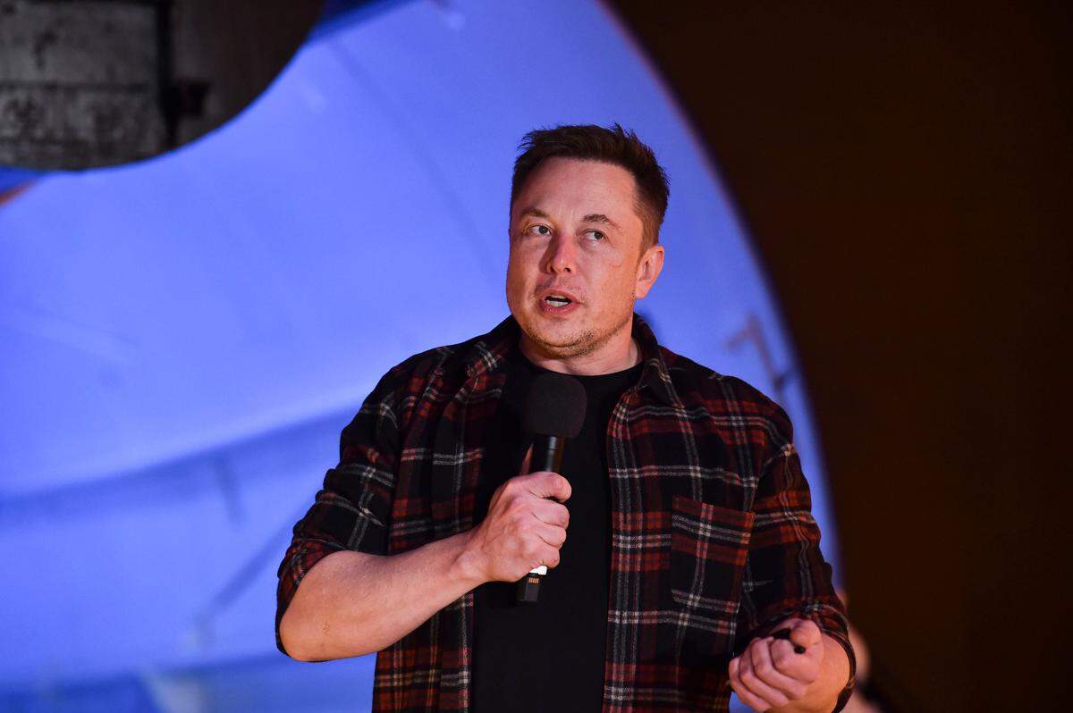 Elon Musk, co-founder and chief executive officer of Tesla Inc., speaks during an unveiling event for the Boring Company Hawthorne test tunnel in Hawthorne, south of Los Angeles, California on December 18, 2018.