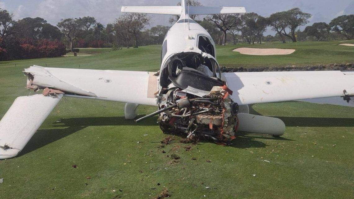 A badly damaged plane is parked on the golf course at Ocean Reef Club in north Key Largo Friday, March 1, 2024.