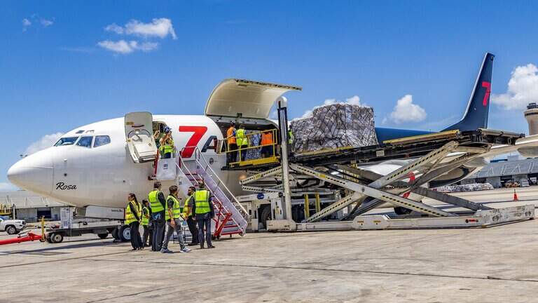Flight carrying first batch of $100 million in U.S. aid to Cuba departs from Miami