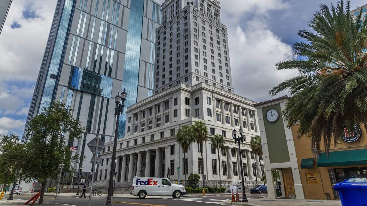 View of the historic and abandoned Miami-Dade County Courthouse which opened in 1928, that has been up for sale for years, but the county can't find a buyer at the right price. Its replacement, the new Osvaldo N. Soto Miami-Dade Justice Center, is seen in the back, in downtown Miami, Florida on Tuesday, June 30, 2026.