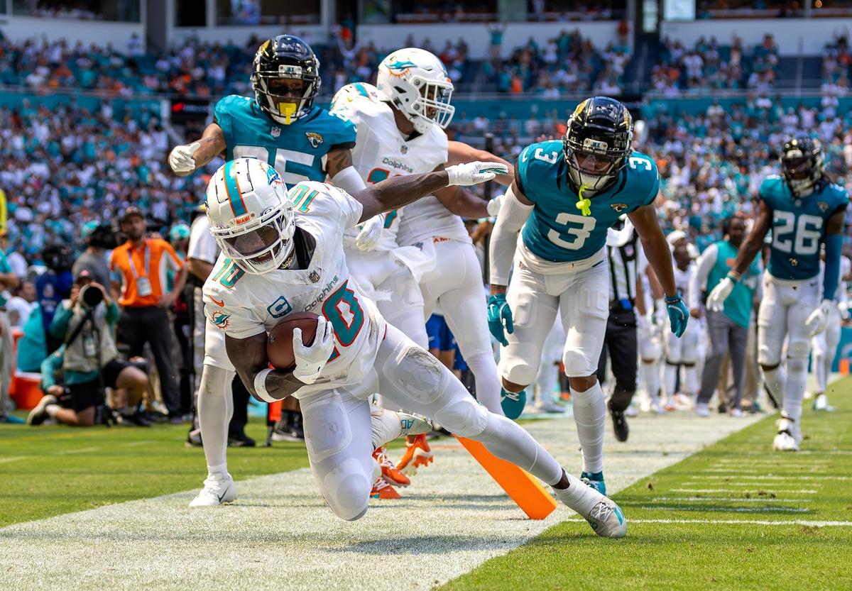 Miami Dolphins wide receiver Tyreek Hill (10) runs out of bounce during the first half of an NFL football game against the Jacksonville Jaguars at Hard Rock Stadium on Sunday, Sep. 8, 2024, in Miami Gardens, Fl.