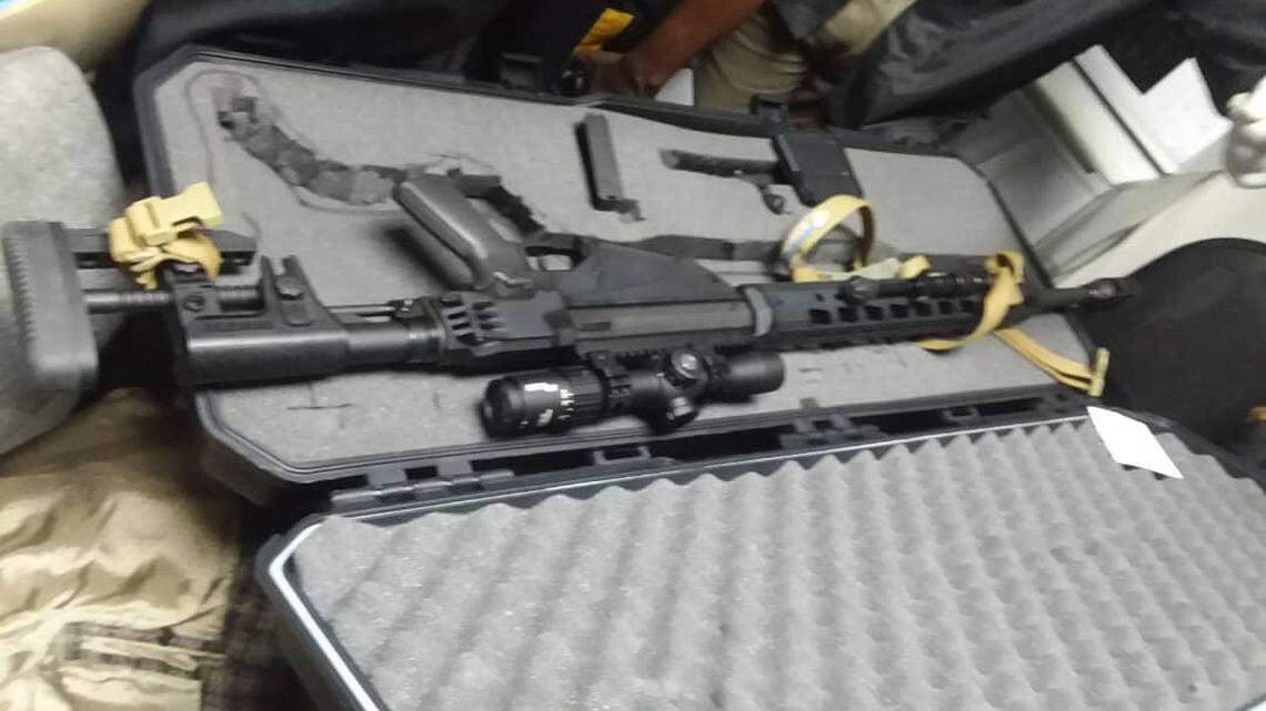 This photo of the weapons brought into Haiti by Jacques Yves Duroseau was circulated on social media after Duroseau’s arrest in Port-au-Prince Tuesday after arriving aboard an American Airlines flight from Miami. Two police officials confirmed that the photos are from the incident.