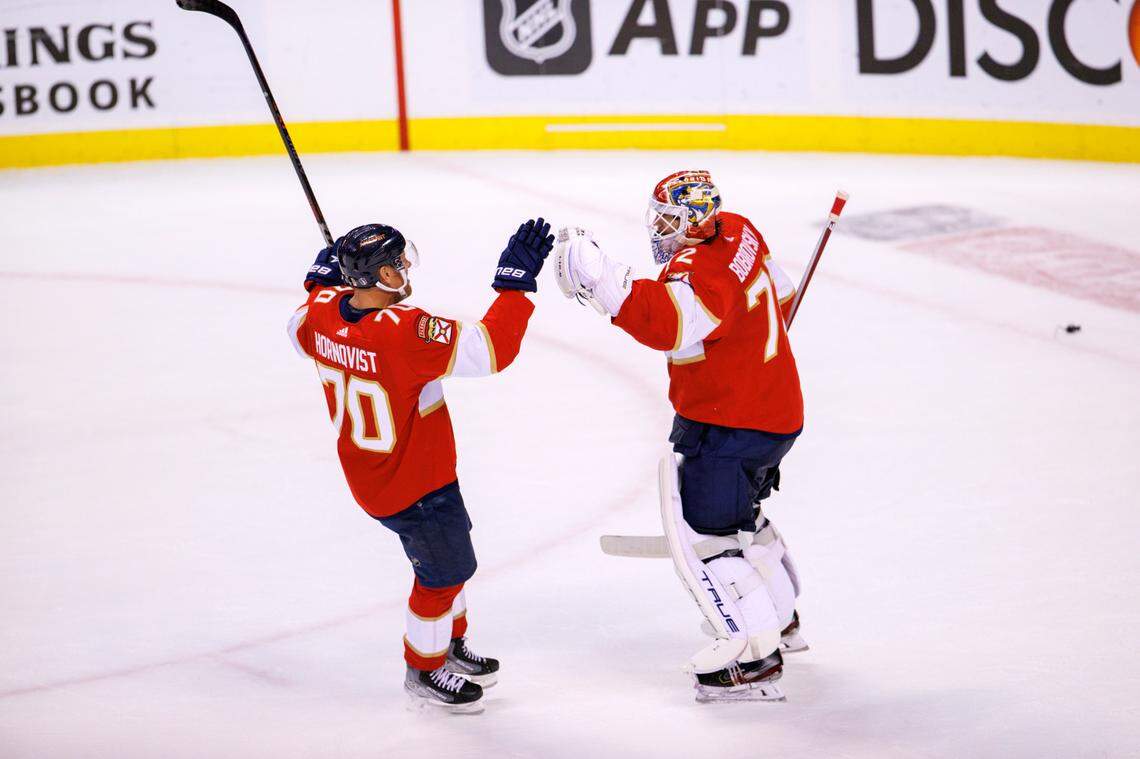 Florida Panthers players Sergei Bobrovsky (72) and Patric Hornqvist (70) celebrate their 5-3 win over the Washington Capitals during Game 5 of a first round NHL Stanley Cup series at FLA Live Arena on Wednesday, May 11, 2022 in Sunrise, Fl.
