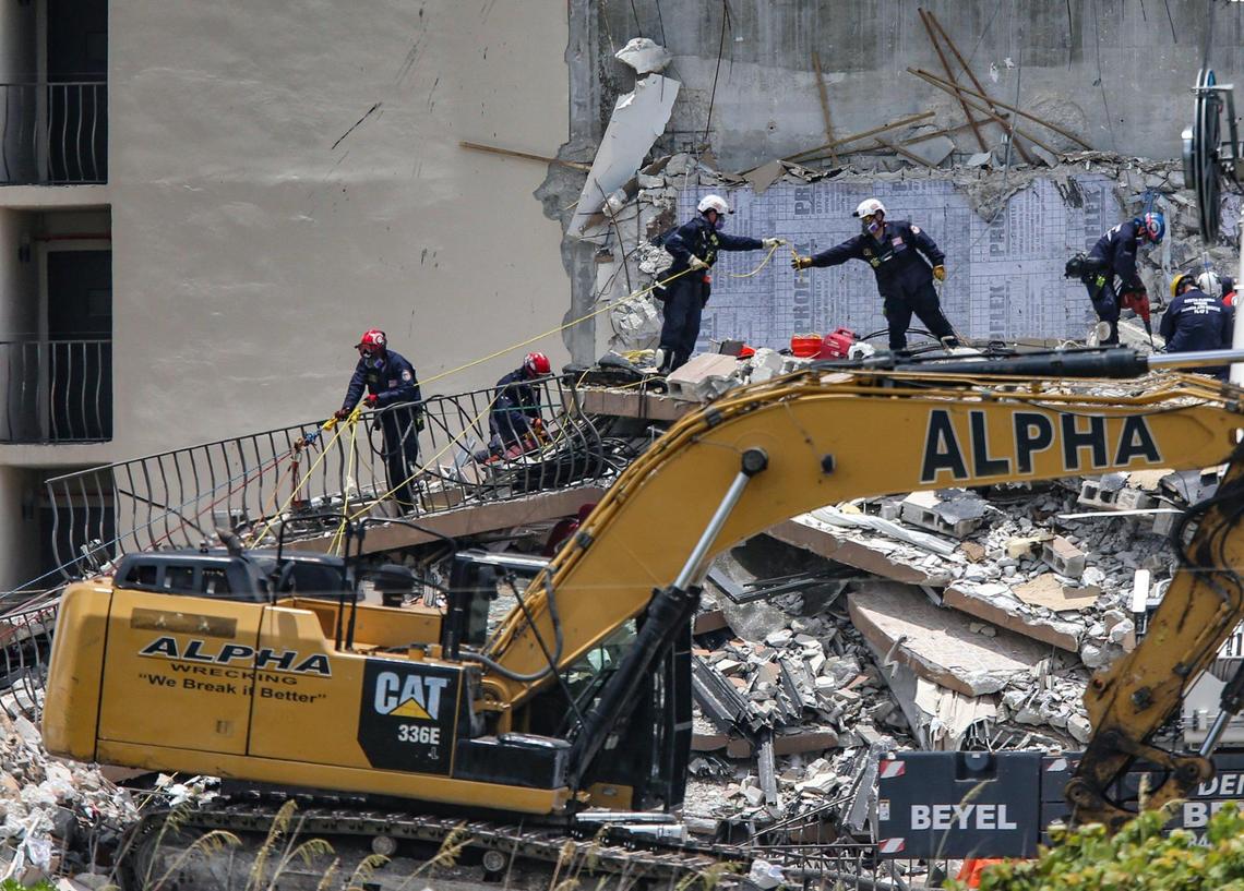 South Florida Urban Search and Rescue team look for survivors at what remained of Champlain Towers South on Saturday.