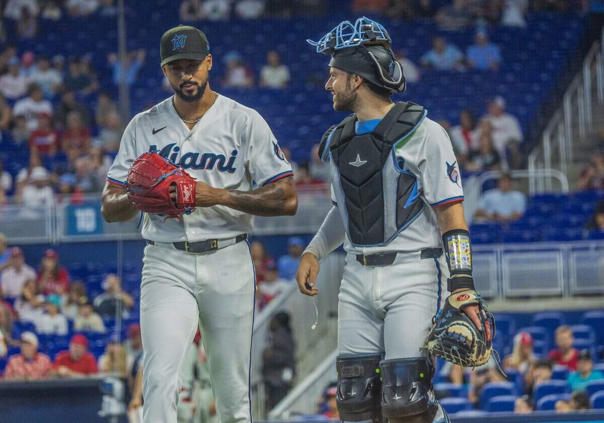 Miami Marlins starting pitcher Sandy Alcantara (22) and catcher Joe Mack (80) leave the field at the end of the first inning of a game against the Philadelphia Phillies, at loanDepot Park in Miami, Fl, on Tuesday July 28, 2026.