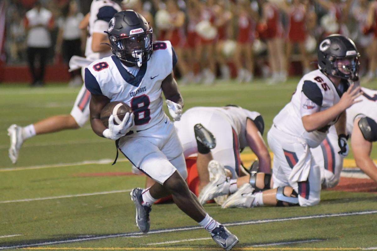 Miami Columbus running back Edward Bandy carries the ball in a game against Doral Academy on Friday, Oct. 14, 2022, at Doral Academy.