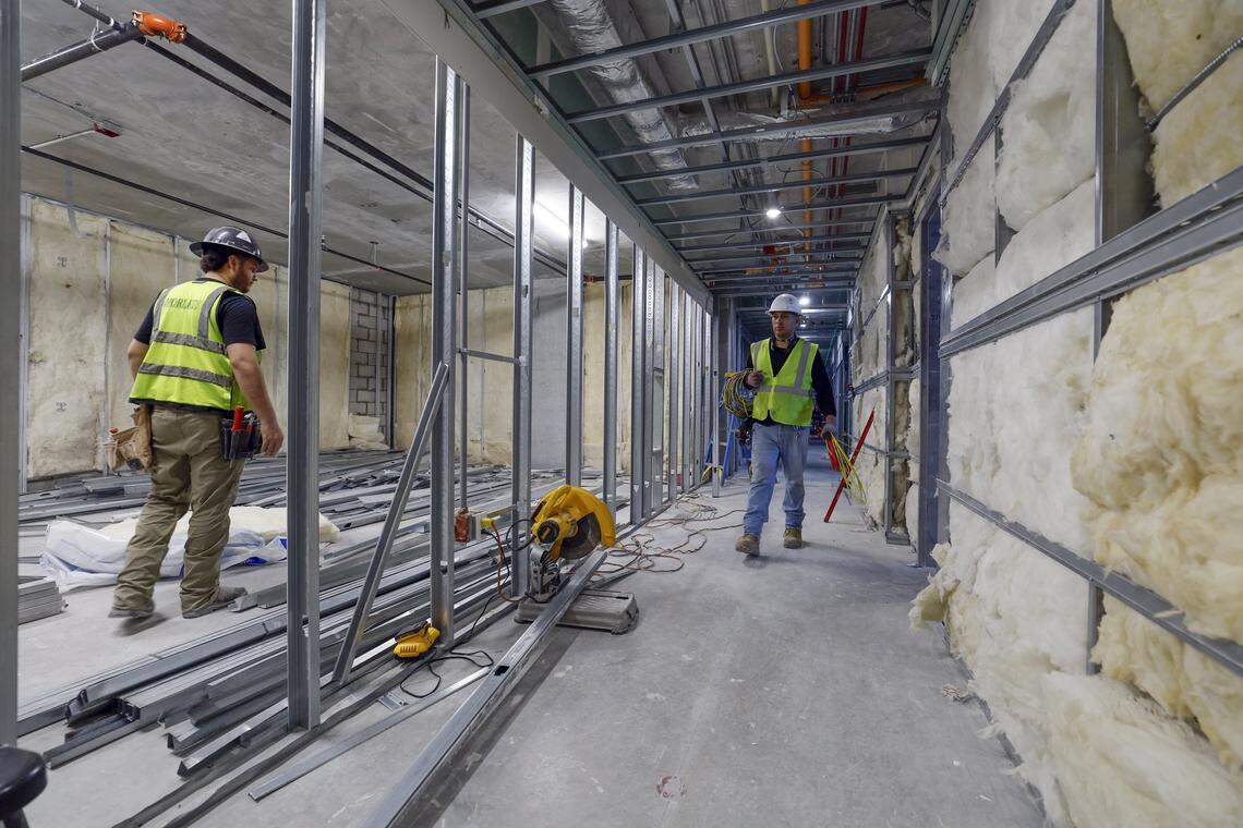 Construction workers are seen at FAT Village. The mixed use residential, arts district, retail and office space is under construction in Fort Lauderdale, Florida, on Thursday, September 25, 2025.