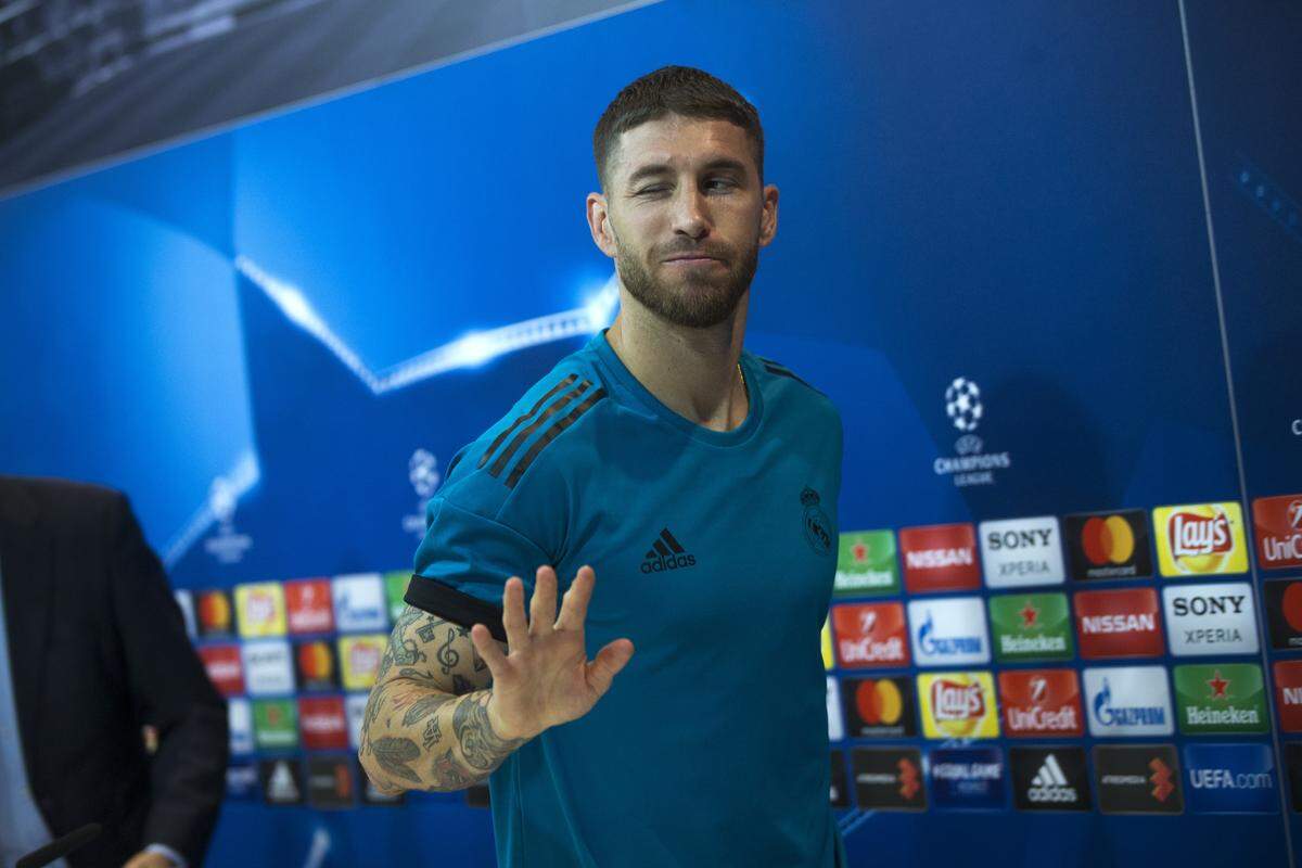 Real Madrid's Sergio Ramos leaves at the end of a news conference at the team's Valdebebas training ground in Madrid, Monday, April 30, 2018. Real Madrid will play a Champions League semi final second leg soccer match with Bayern Munich on Tuesday, May 1. (AP Photo/Francisco Seco)