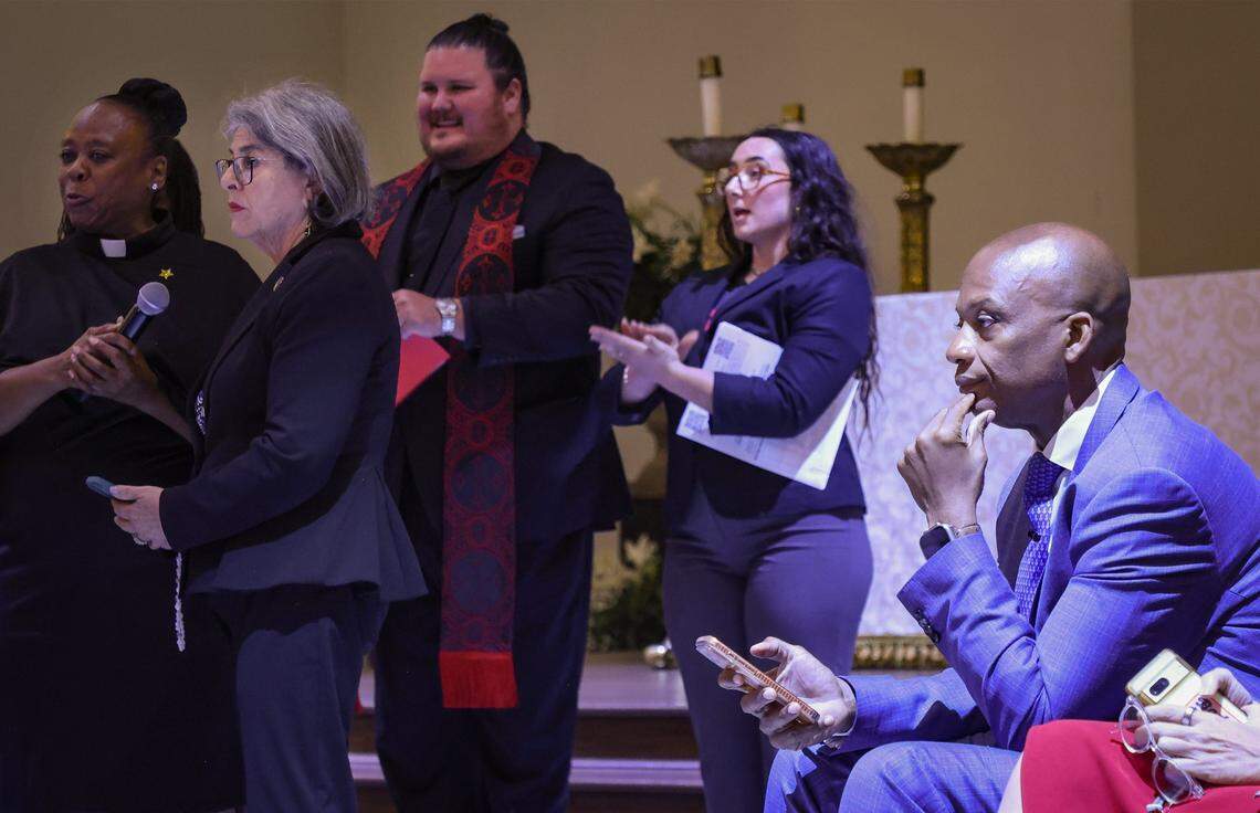 Mayor Daniella Levin Cava, right, gets applause from religious leaders and attendees after giving her support for opening the Center for Mental Health and Recovery as Miami-Dade Commissioner Oliver G. Gilbert, III, right, waits to respond.