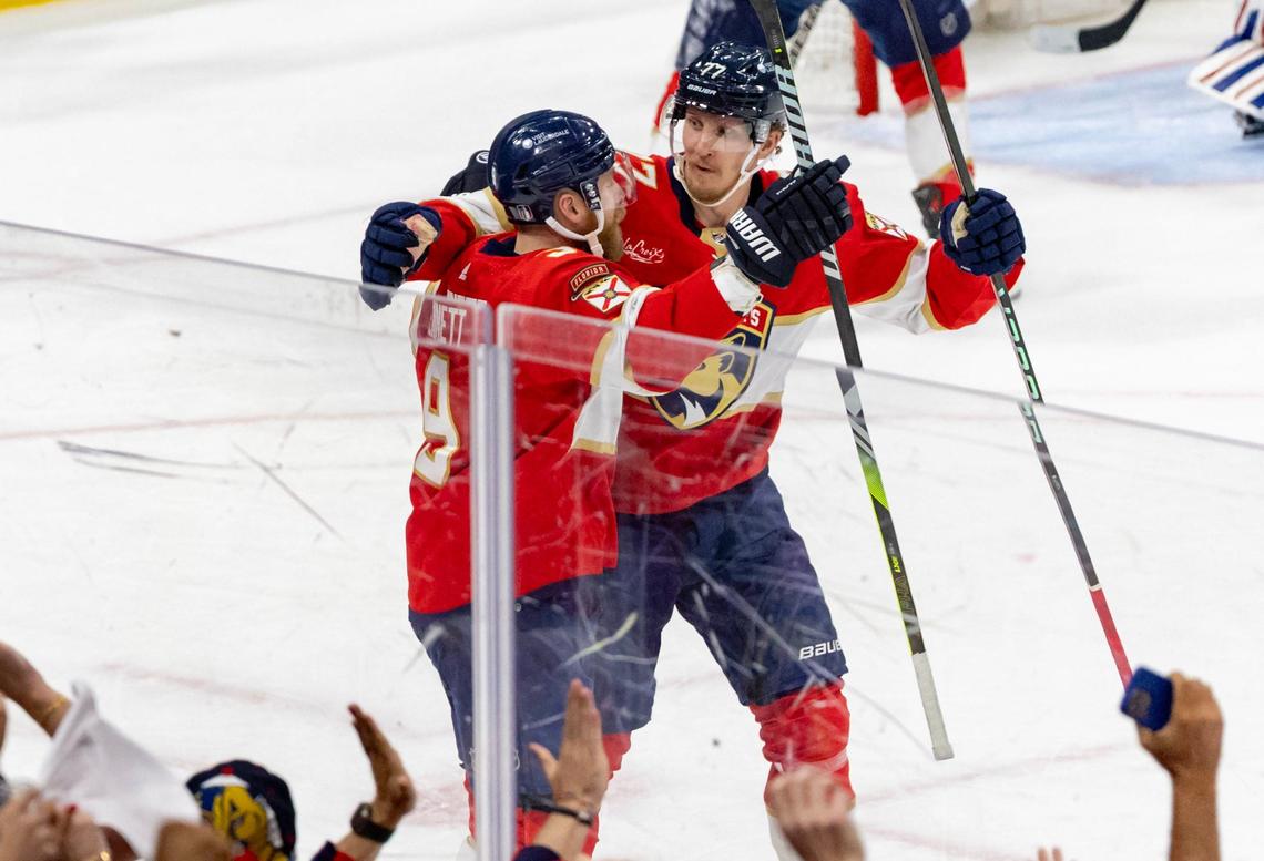 Florida Panthers center Sam Bennett (9) celebrates with teammate Niko Mikkola (77) after scoring a goal against the New York Rangers during the first period of Game 6 during the Eastern Conference finals of the NHL hockey Stanley Cup playoffs at the Amerant Bank Arena on Saturday, June 1, 2024, in Sunrise, Fla.