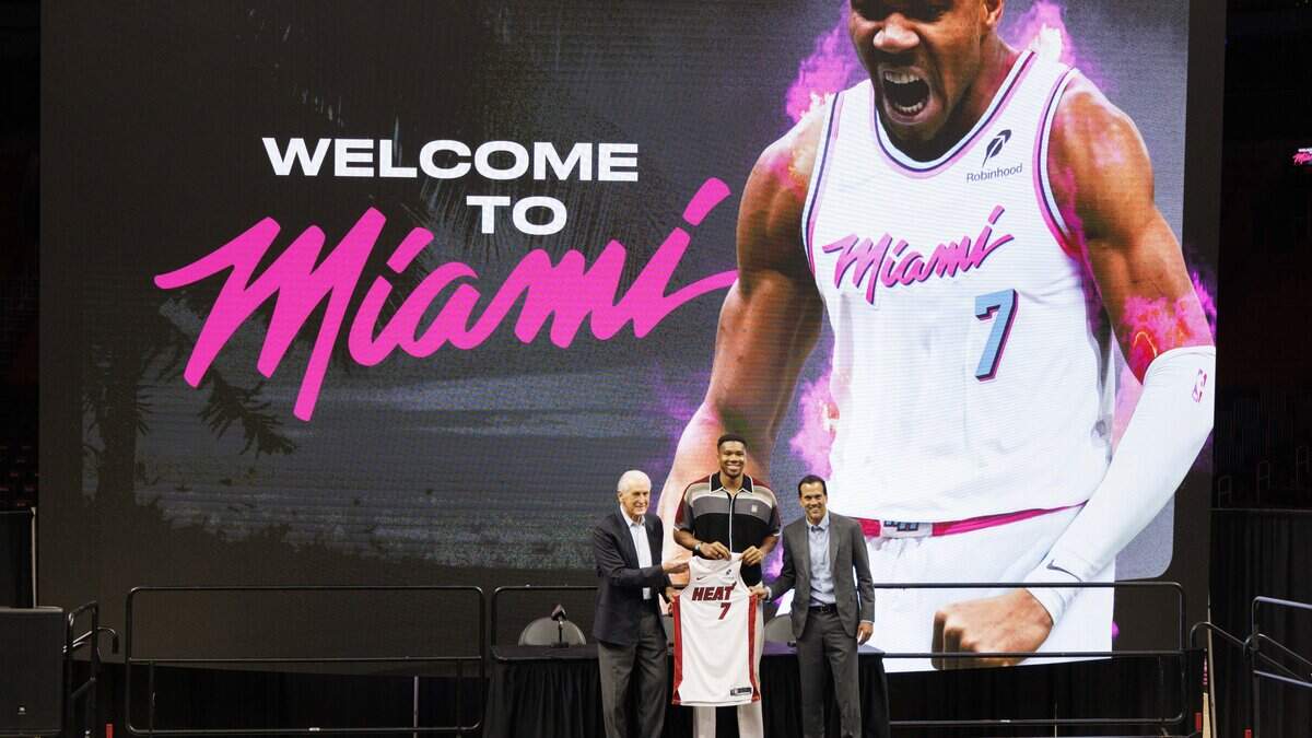 Giannis Antetokounmpo (7) poses with Pat Riley, President of the Miami Heat, left, and Head Coach Erik Spoelstra during a press conference introducing Portis to the Miami Heat on Thursday, July 16, 2026, at the Kaseya Center in downtown Miami, Fla.