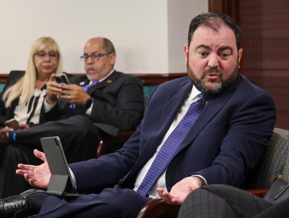 Doral City Attorney Lorenzo Cobiella talks with Connie Diaz, Doral’s city clerk, after the Irina Vilarino’s hearing was rescheduled on Monday, Aug. 12, 2024, in downtown Miami.