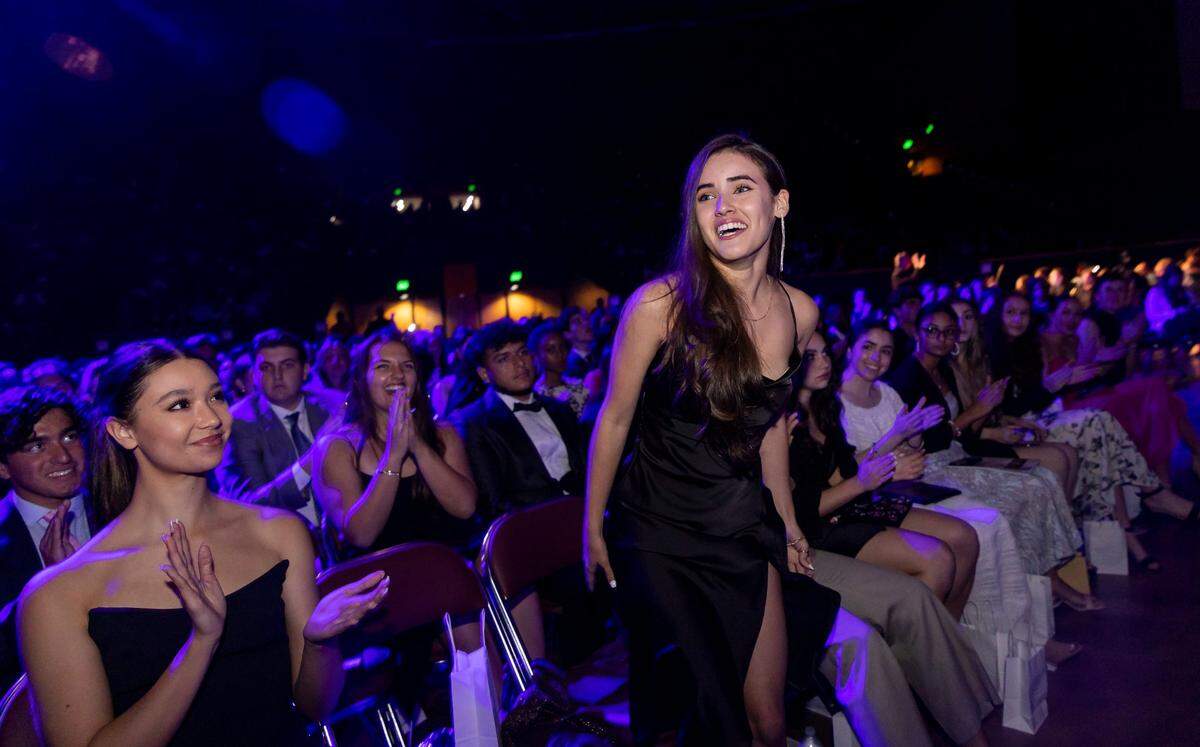 Silver Knight winner Isabella León, from Calvary Christian Academy, walks to the stage after winning in the Art category during the Miami Herald & el Nuevo Herald 65th Silver Knight Award Ceremony at the James L. Knight Center on Thursday, May 25, 2023, in downtown Miami, Fla.