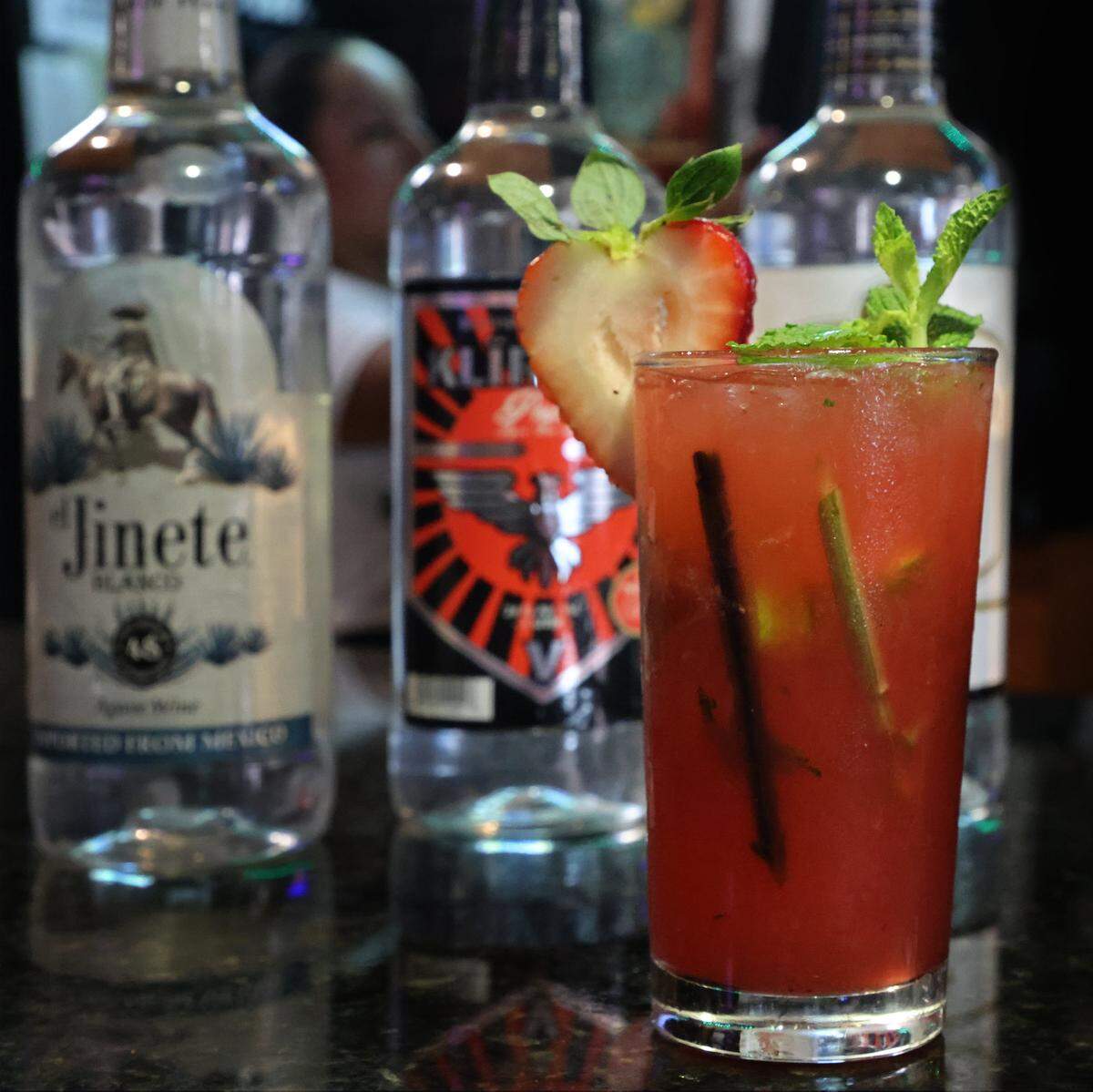 O. Gino Santos, president of Premium Blend, started a spirits business for beer and wine licensed restaurants and bars that can be used to make cocktail drinks like mojitos and other mixed drink cocktails. Pictured are variety of Premium Blend brands used to a strawberry mojito.