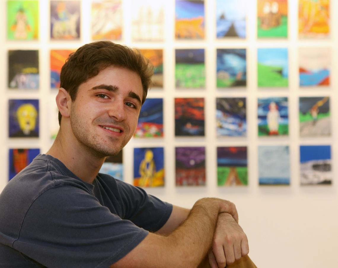 Matthew Hanzman, a 21 year old artist and University of Miami Student poses for the picture at Fairchild on Thursday July 26, 2018 in Coral Gables.