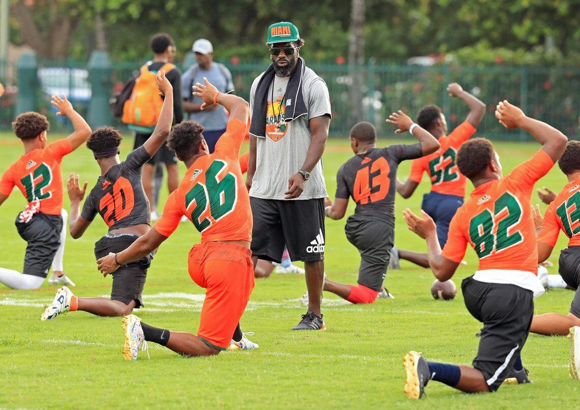 Former NFL and UM player Ed Reed coaches high school recruits at UM’s Paradise Camp. the camp draws some of the top football recruits (11th and 12th graders) in the nation -- and some of the legends of UM’s past to serve as instructors at the Intramural Fields on campus at the University of Miami on Saturday, July 22, 2017.