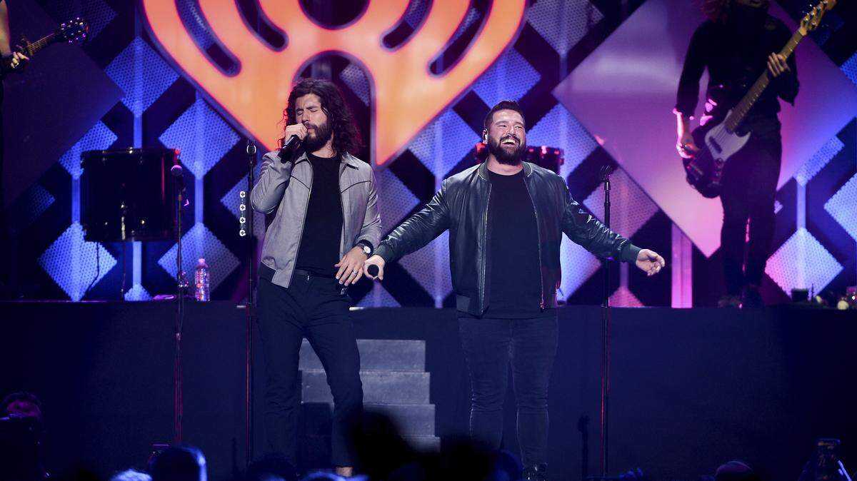 Singer-songwriters Dan Smyers, left, and Shay Mooney of Dan + Shay perform at Z100’s iHeartRadio Jingle Ball 2019 at Madison Square Garden on Friday, Dec. 13, 2019, in New York. The duo have been added to the Bud Light Super Bowl Fest in Miami on Feb. 1, 2020.