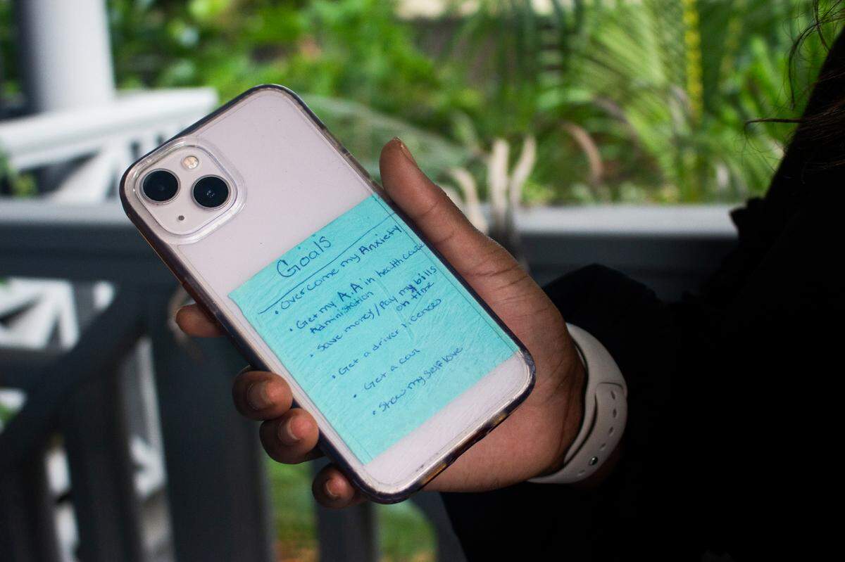 Selena keeps a list of goals on the back of her phone case as a reminder to stay focused.