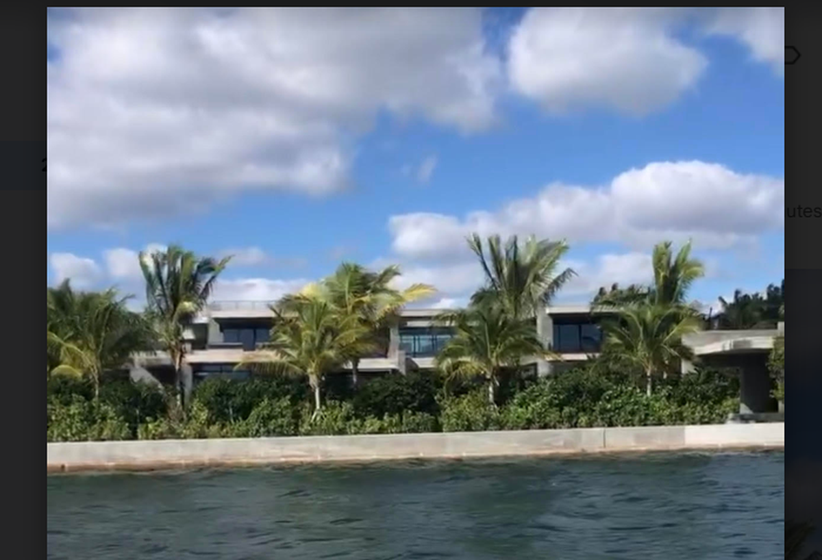 Tom Brady’s eco-friendly mansion in Indian Creek Village in Miami Beach is seen from a passing boat.