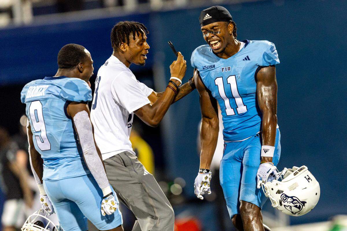 Florida International University wide receiver Dean Patterson (11) reacts to defeating University of North Texas 46-39 during the second half of a college football game at Riccardo Silva Stadium in Miami, Florida, on Saturday, September 9, 2023.