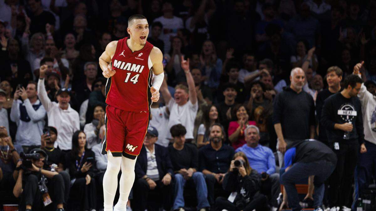 Miami Heat guard Tyler Herro (14) reacts to making a basket in the last few minutes of the game against the Dallas Mavericks on Monday, Nov. 24, 2025, at Kaseya Center in Miami.