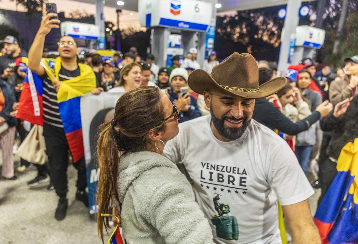 Julian Pantoja and Any Gonzalez de Fernandez were among a group of Venezuelan exiles living in South Florida celebrating outside of El Arepazo in Doral, Florida, after the United States attacked Venezuela and captured Venezuelan leader Nicolás Maduro, on Jan. 3, 2026.