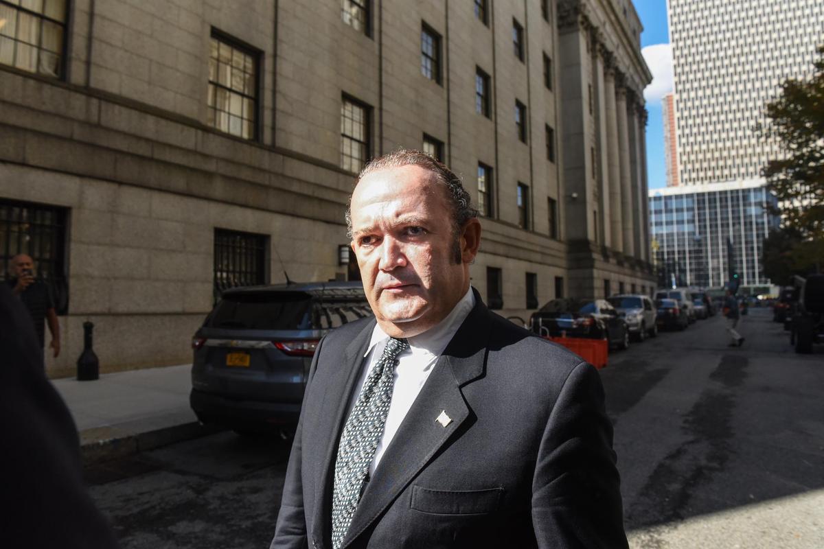 Igor Fruman leaves federal court the day of his arraignment hearing, Oct. 23, 2019, in New York City. Fruman and Lev Parnas, along with Andrey Kukushkin and David Correia, are associates of Rudy Giuliani who were arrested and charged with conspiring to circumvent federal campaign finance laws.