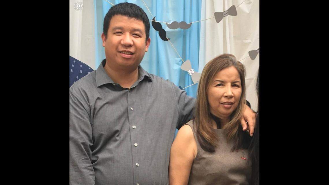 This photo shows Nguyet Le and her son Nguyen Le. Nguyen Le and his siblings are suing over their mother’s death.