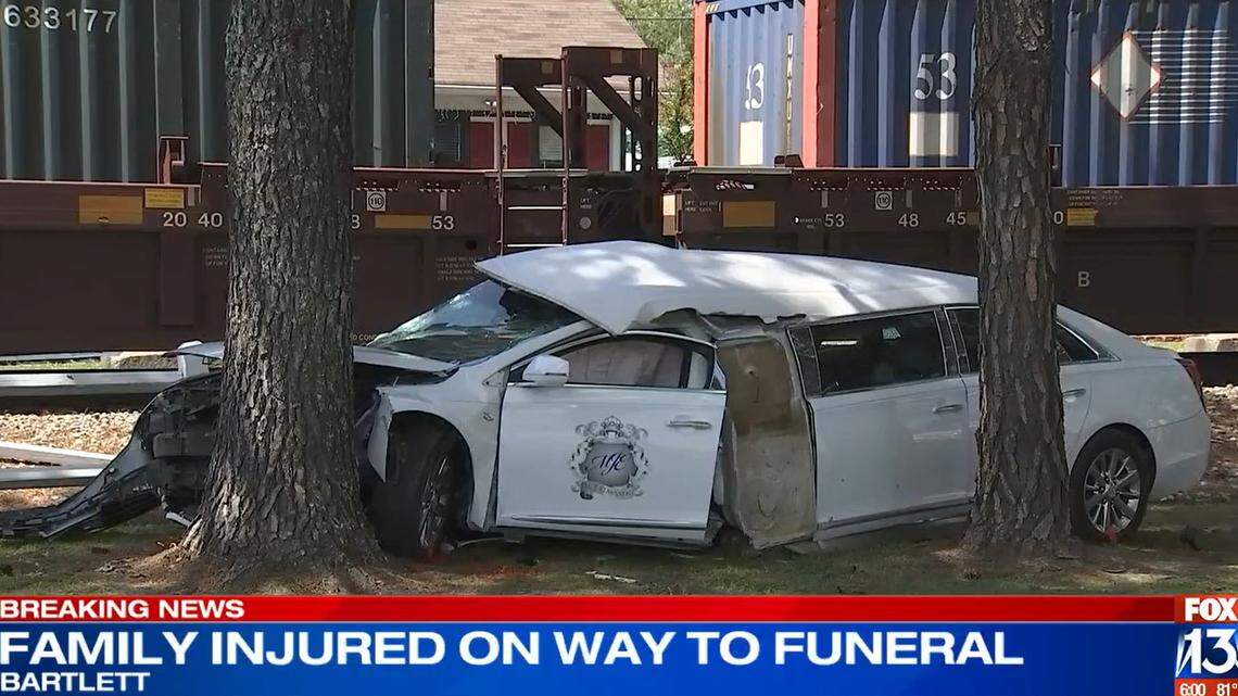 Six people were injured when a funeral home limo was struck by a train in Tennessee, officials said.