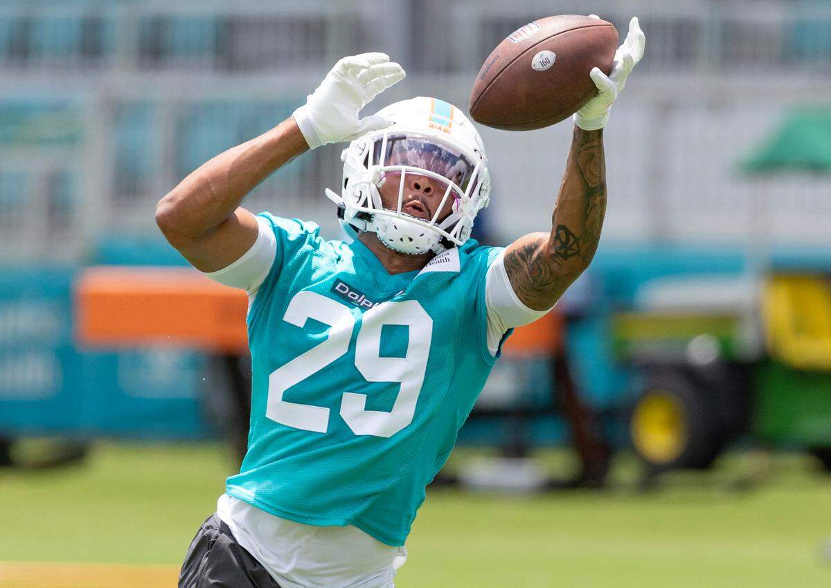 Miami Dolphins safety Dante Trader Jr. (29) attempts to catch the ball during drills at OTA’s “Organized Team Activities,” at the Baptist Health Training Complex in Miami Gardens, Florida, on Wednesday, May 28, 2025. 