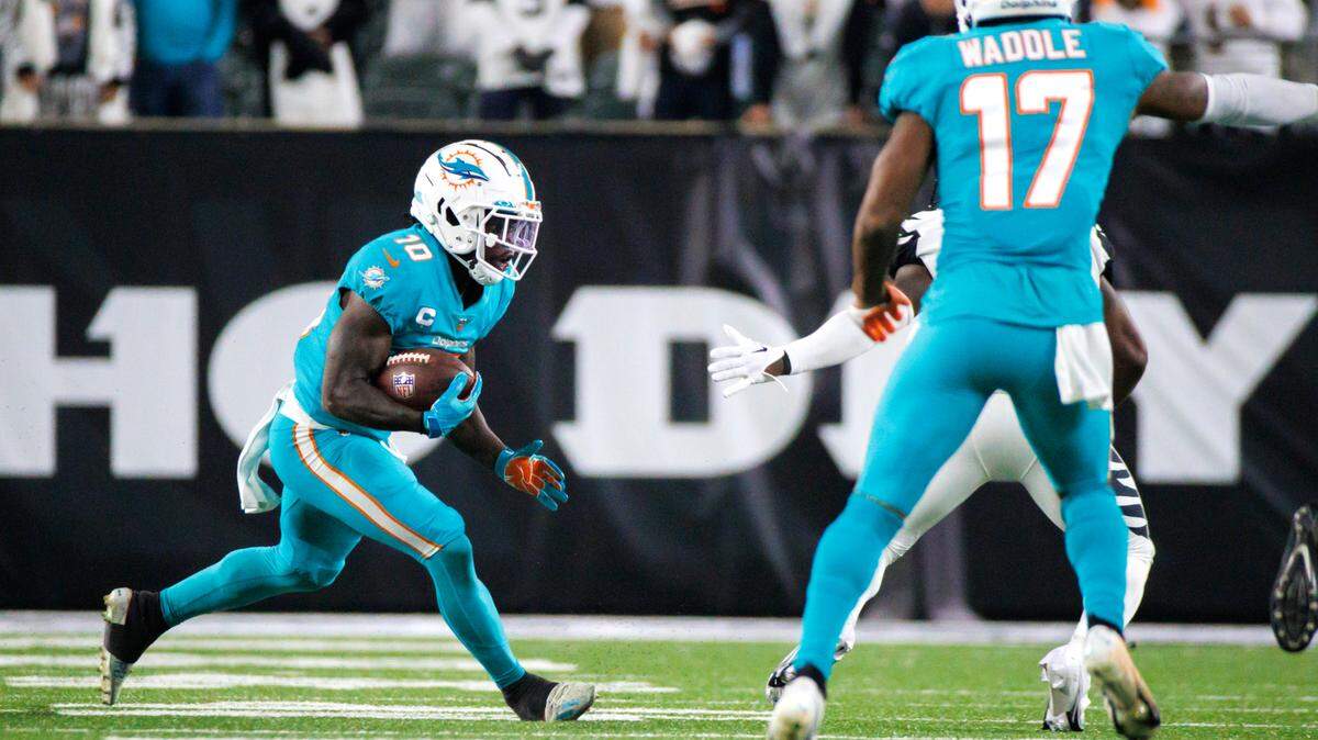 Miami Dolphins wide receiver Tyreek Hill (10) runs with the football during the fourth quarter of an NFL football game against the Cincinnati Bengals at Paycor Stadium on Thursday, September 29, 2022 in Cincinnati, Ohio.